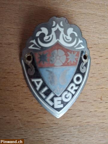 Bild 1: Allegro  Velo Steuerkopf  CH  Schild Emblem